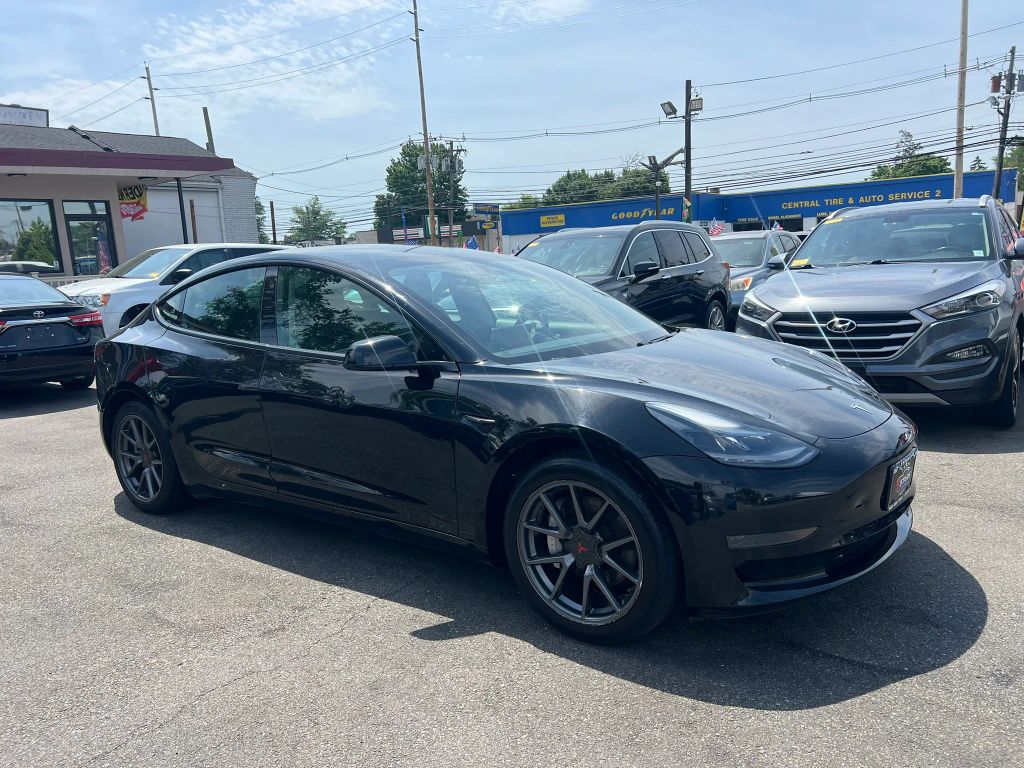 tesla model 3 2021 5YJ3E1EA8MF048553 image tesla model 3 2021 5YJ3E1EA8MF048553 image